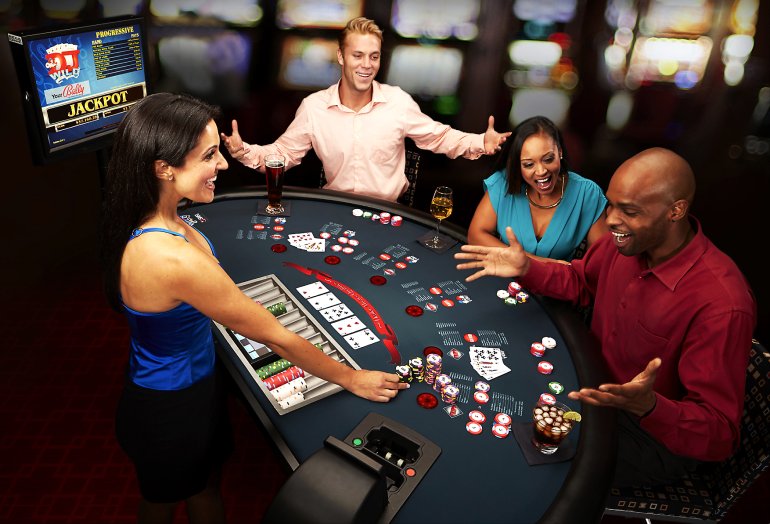 An African-American man has won in baccarat, friends are happy for him